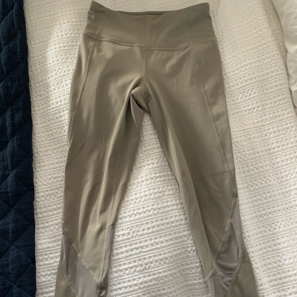 Athleta tan leggings with mesh detail size xs